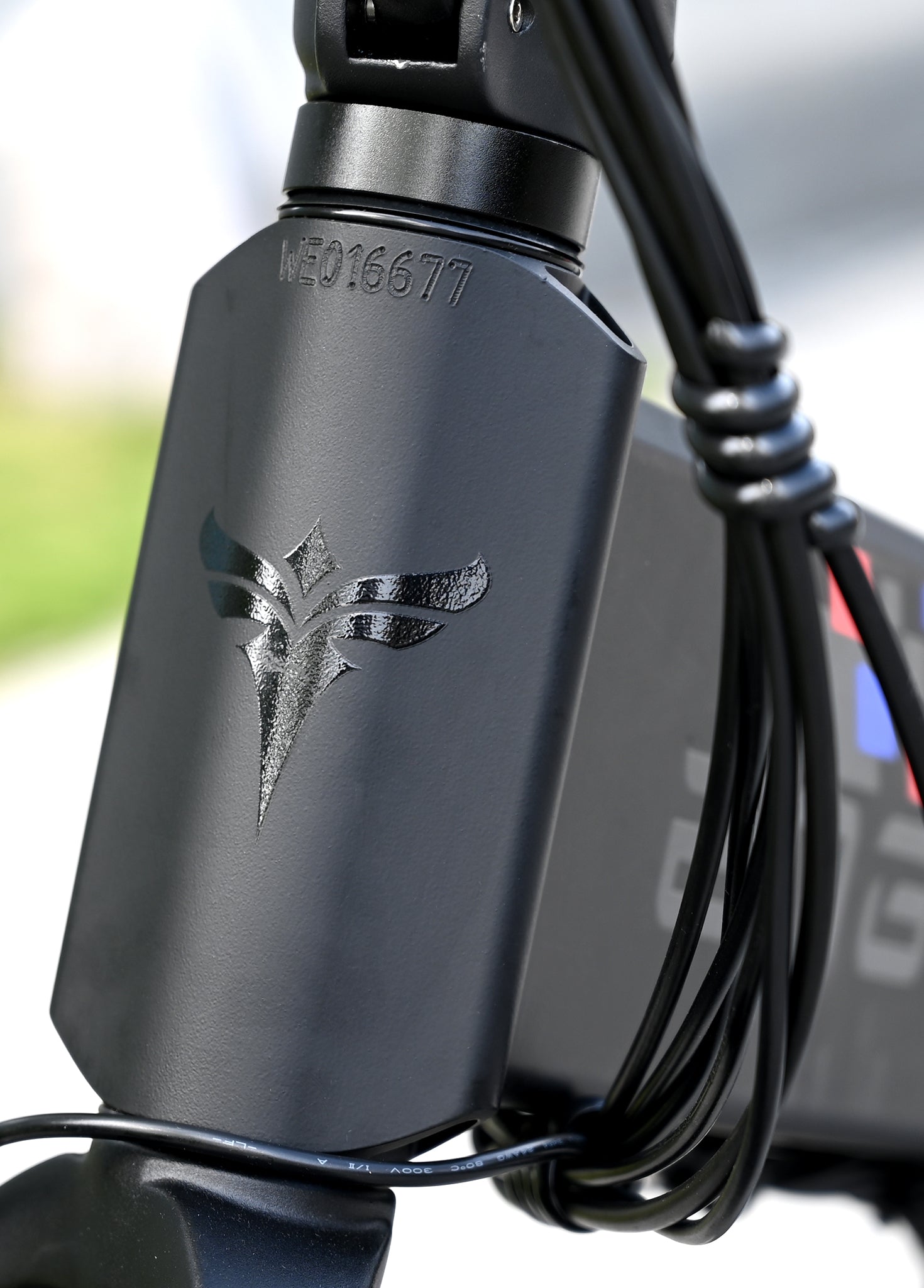 Close-up of the ENGWE Engine X showcasing the logo, highlighting its sleek design and powerful features.