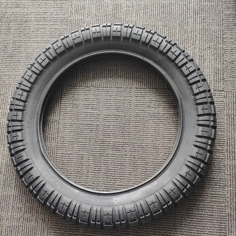 20 x 4.5 fat bike heavy duty tire showcasing durable rubber construction and robust tread design.