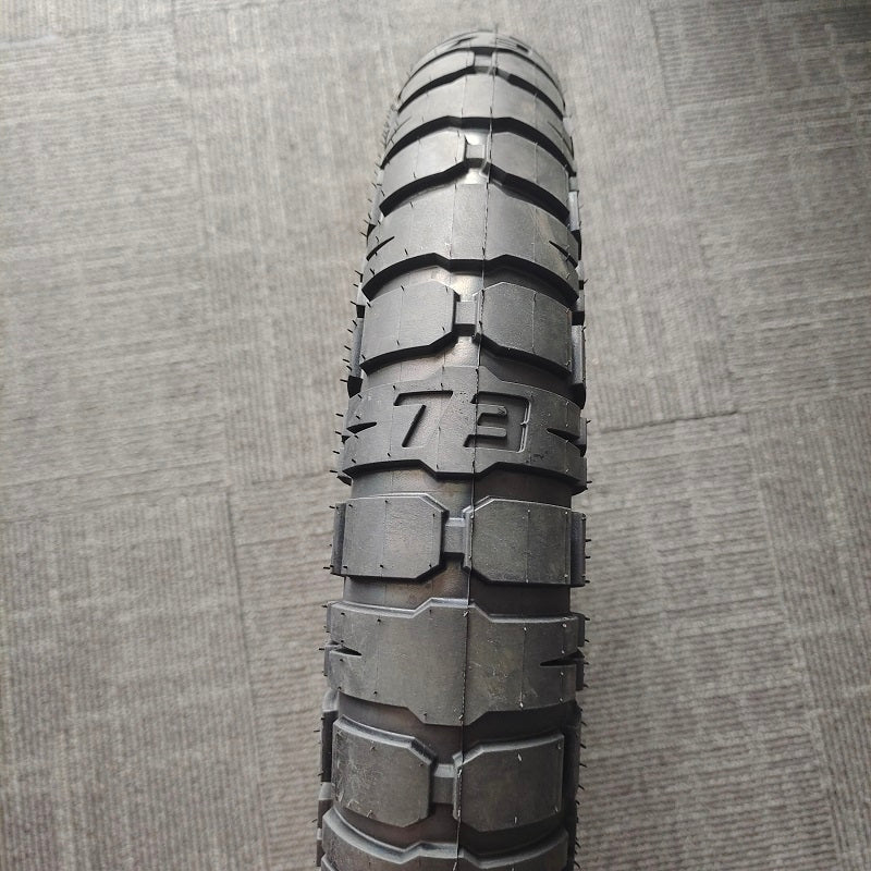 Close-up of a 20 x 4.5 fat bike heavy duty tire showcasing its rugged tread pattern.